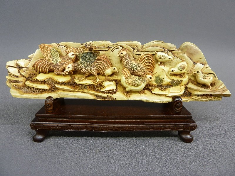 CHINESE QUALITY HAND CARVED IVORY TUSK , W 10" H 4.25" : CHINESE QUALITY HAND CARVED IVORY TUSK , W 10" H 4.25" with 1.25" stand :Chinese carved ivory features a group of roosters, chicks and a hen. No apparent markings. Includes a wood stand.