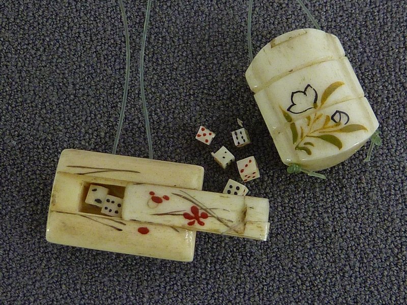 2 IVORY MINIATURE INROS ONE WITH 3 DICE INSIDE, ONE WI: 2 IVORY MINIATURE INROS ONE WITH 3 DICE INSIDE, ONE WITH 5 DICE INSIDE- L .75" W .5", Circa 1920