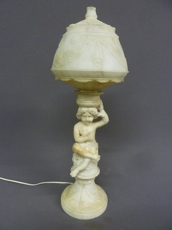 Late 19th/Early 20th Century Carved 24" Alabaster Lamp: Late19th /Early 20th Century Carved Alabaster Putti 23.5" Lamp & Shade - lamp has garland & bow shade and putti has grape & leaves - Hgt. 23.5 " Dia.8"- good conditio