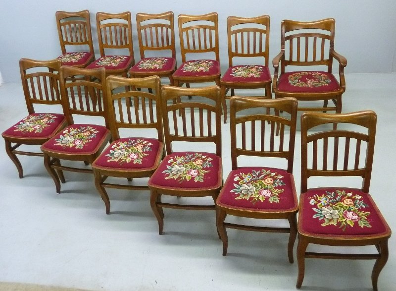 Set of 12 Solid Oak American Dining Chairs from John H.: Set of 12 Solid Oak American Dining Chairs from John H. Knapp House, Menomonie WI. Circa 1900 - original finish, Hand made needle point seats dated, h 37" w 20" d 18" - tight condition. Marked Colonia