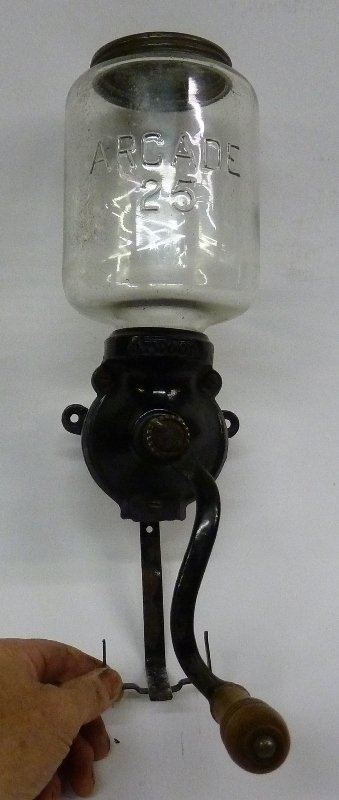 Signed "Arcade" Glass & Iron Coffee Grinder with Metal: Signed "Arcade" Glass & Iron Coffee Grinder with Metal Arcade Top - height 15" width 5" - circa 1900 , good condition