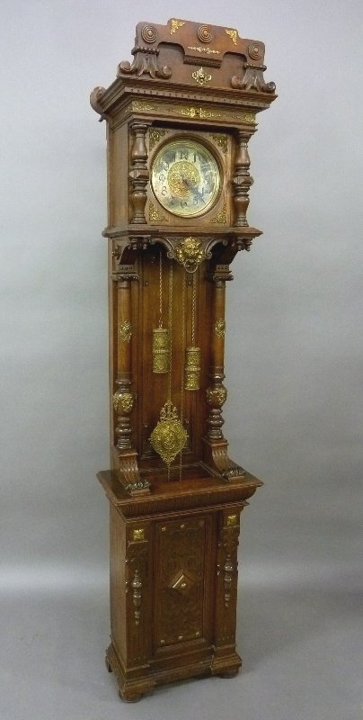 Circa 1880's Signed Gustav Becker Ormolu Mounted Carved: Circa 1880's Signed Gustav Becker Ormolu Mounted Carved Oak 2 Weight Grandfather Clock with Ornate Brass weights and woman and cupid on pendulum - height 93.5", width 23" depth 13" - good running cond
