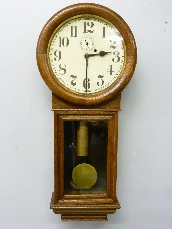 Signed "Seth Thomas" No. 2 Regulator, 1/4 Cut Oak: New Haven Clock Co. Saturn Weight Driven Wall Clock, 1/4 Cut Oak Case - height 34 3/4" width 15 1/4" - good condition
