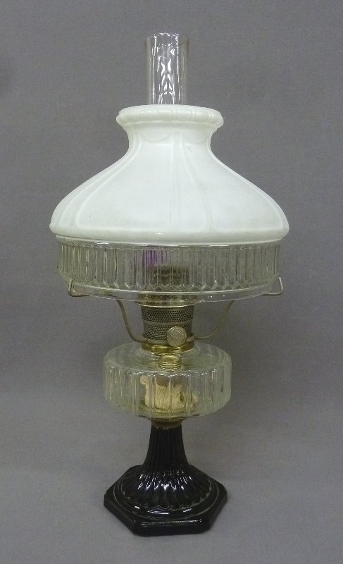 Signed Aladdin Lamp Co. Chicago ILL. Black and Clear: Signed Aladdin Lamp Co. Chicago ILL. Black and Clear Glass Oil Lamp with Aladdin White and Clear Shade - found in Winona MN. - height 23" dia. 11" - good condition