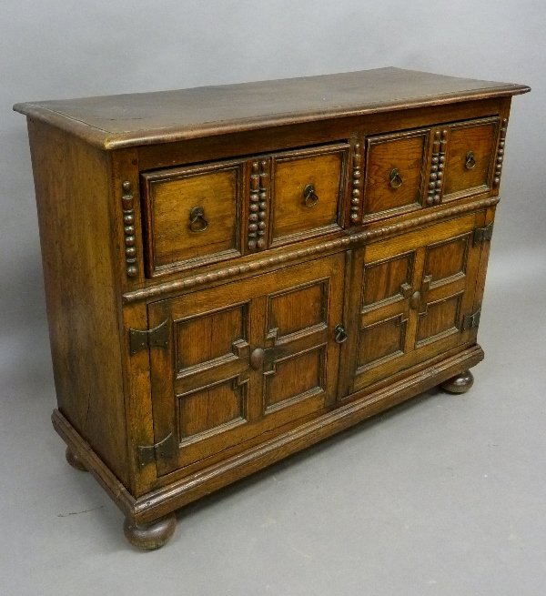 Early 19th Century Oak Buffet with Wood Pegged and Hand: Early 19th Century Oak Buffet with Wood Pegged and Hand Made Nail Construction - width 48" height 36" depth 18.5" - one end now has file cabinet hidden in the lower part of the buffet - good solid con