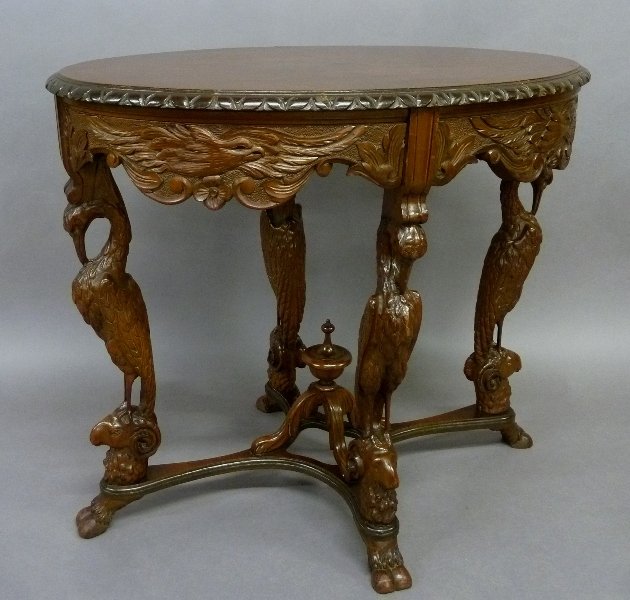 Circa 1920's Rare Walnut Stork and Rams Head Carved: Circa 1920's Rare Walnut Stork and Rams Head Carved Parlor Table with Eagles carved on the apron - height 30" width 34" depth 22" - found in North Oaks Mn home - great original finish and condition.