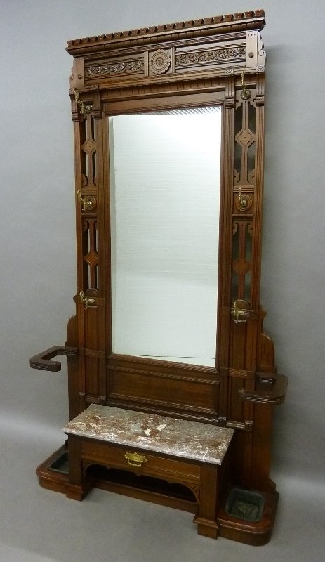 Circa 1880 Walnut American Eastlake Marble Top Halltree: Circa 1880 Walnut American Eastlake Marble Top Halltree with Umbrella Stands on each side plus glove drawer under a marble top and 6 brass hooks with fish . Height 92" width 51" depth 15" - old refini