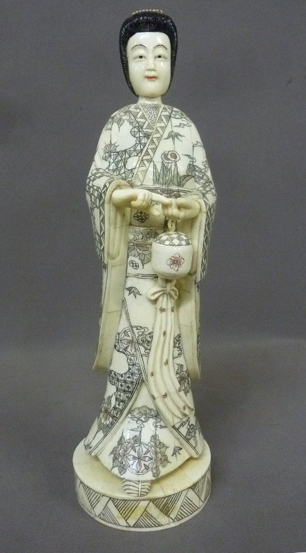 Early 20th Century Carved Bone Figure of Asian Woman: Early 20th Century Carved Bone Figure of Asian Woman with Basket - height 16.5" dia. 5" - good condition except for some cracking in the hair. Found in Red Wing Mn estate.