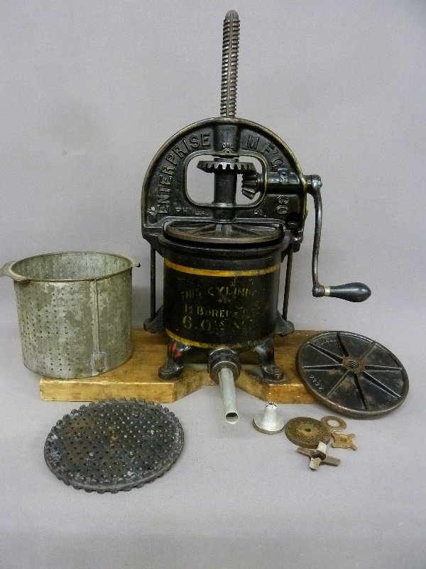 Circa 1900 - 1920 Cast Iron Stuffer Signed Enterprize (1 of 4)