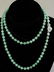 33" Green Jade Strand with 7.5mm beads. Clasp marked