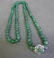 33" Green Jade Strand with 7.5mm beads. Clasp marked - 2