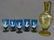 Circa 1900 6 pc Blue & Amber Mary Gregory Beverage Set.