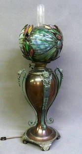 Rare Circa 1890's Oil Lamp with Fantastic Slag Glass: Rare Circa 1890's Oil Lamp with Fantastic Slag Glass Globe. Has winged Woman on Lamp Base - Now electrified. Height 33" Dia. 10". Found in very old antique dealers house in Mple Mn. 2 hairlines in 9th