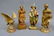 Group of 4 Hand Carved Wooden Figures Depicting