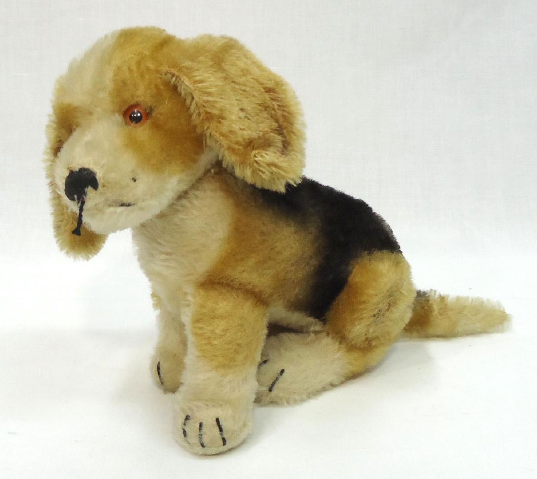 Steiff Dog: w/ button on ear. 7 1/2"T x 10"L w/ tail