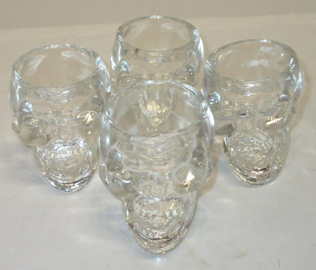 4 Glass Skull Shot Glasses: 2 1/2"T x 2 1/2"W x 3"