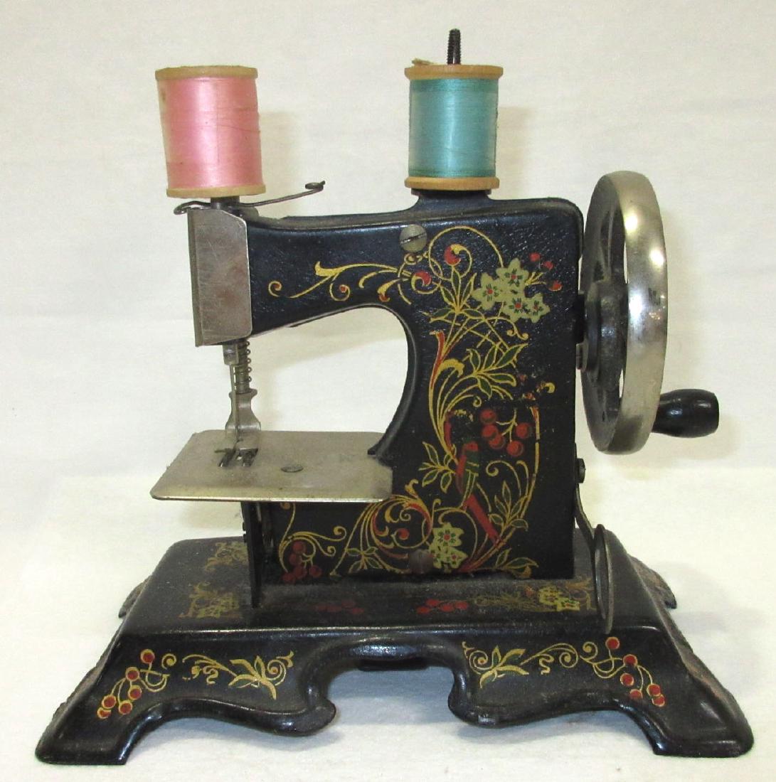 Child's Stenciled Toy Sewing Machine: 7"T x 7" x 4"