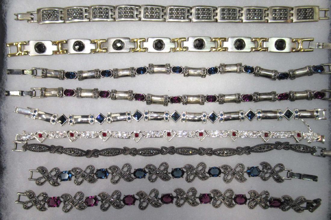 9 Multi-Stone Silvertone Bracelets (1 of 2)