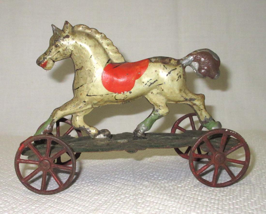 Early Tin Horse on Platform Toy (1 of 2)