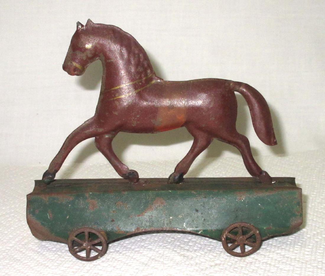 Early Tin Horse on Platform Toy (1 of 3)