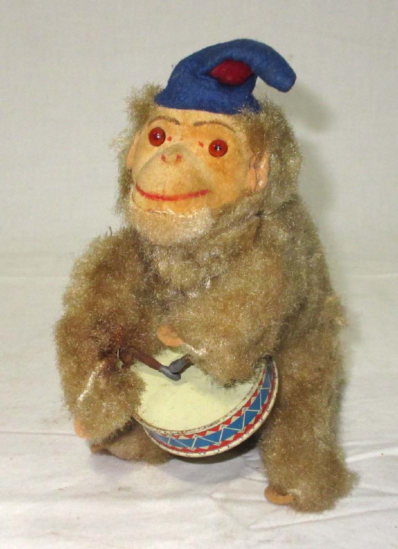 West German Key Wind Monkey Toy: Action Sticks 7"T x 6" x 4"