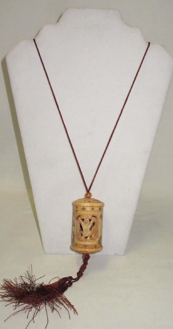 Carved Ox Bone Inri: 2 1/2" carving, 26" Tie