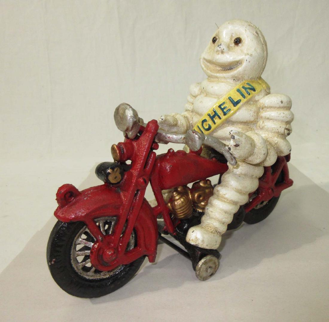 Modern Michelin Man Motorcycle Toy: 6 3/4"T x 9"L