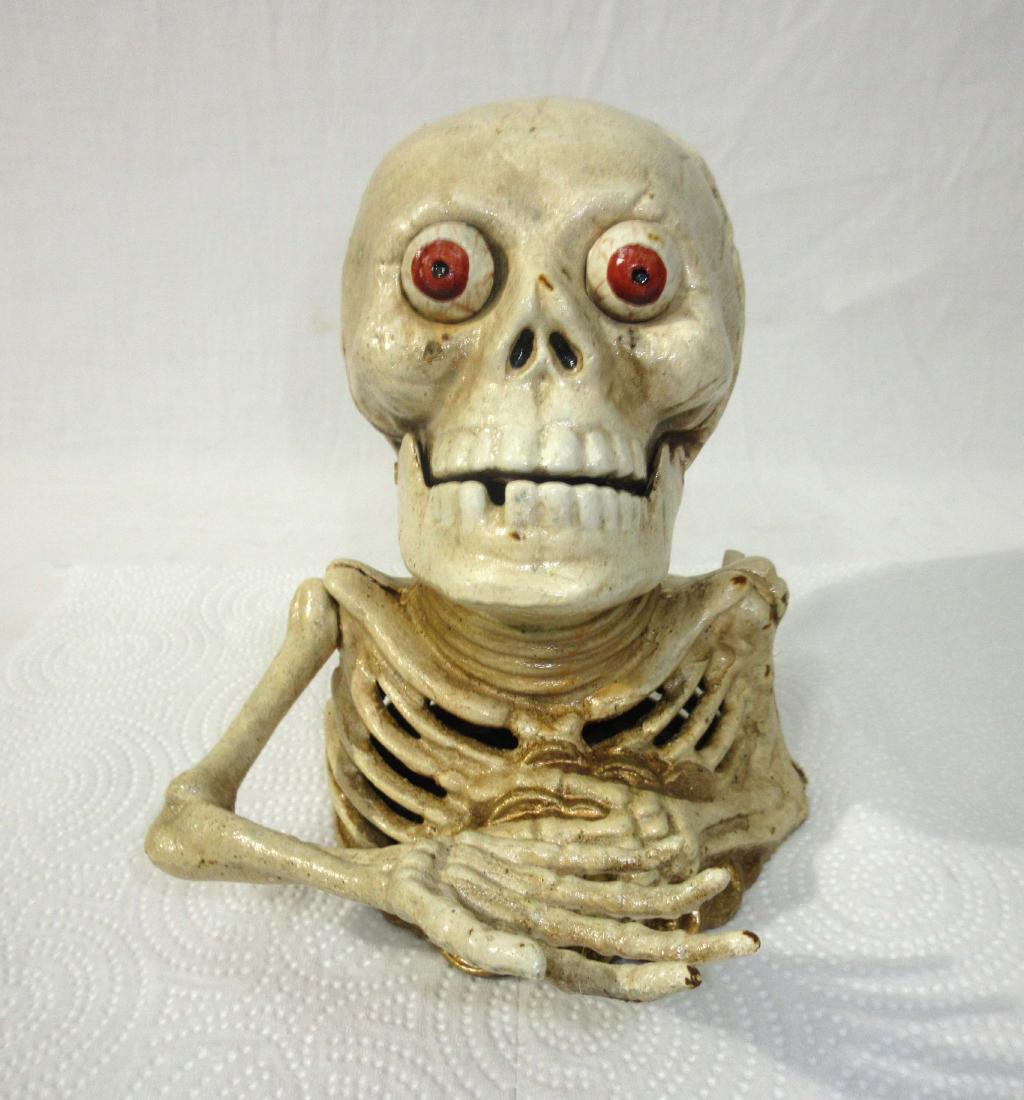 Modern Cast Iron Skeleton Coin Bank: 6 1/2"T x 7"W