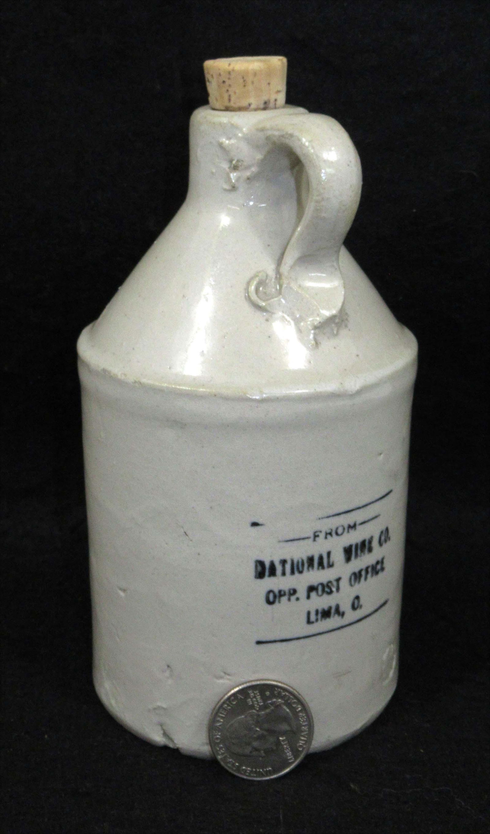 Miniature Stoneware Advertising Jug (1 of 4)