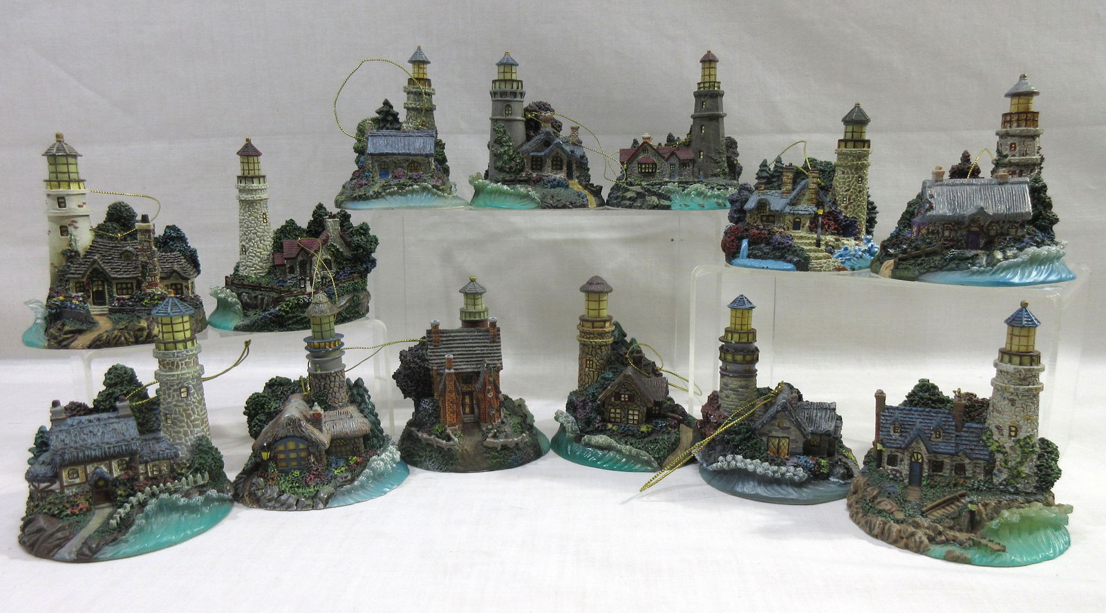 13 Thomas Kinkade Lighthouse Illuminated Ornaments: All approx. 3 3/4"T