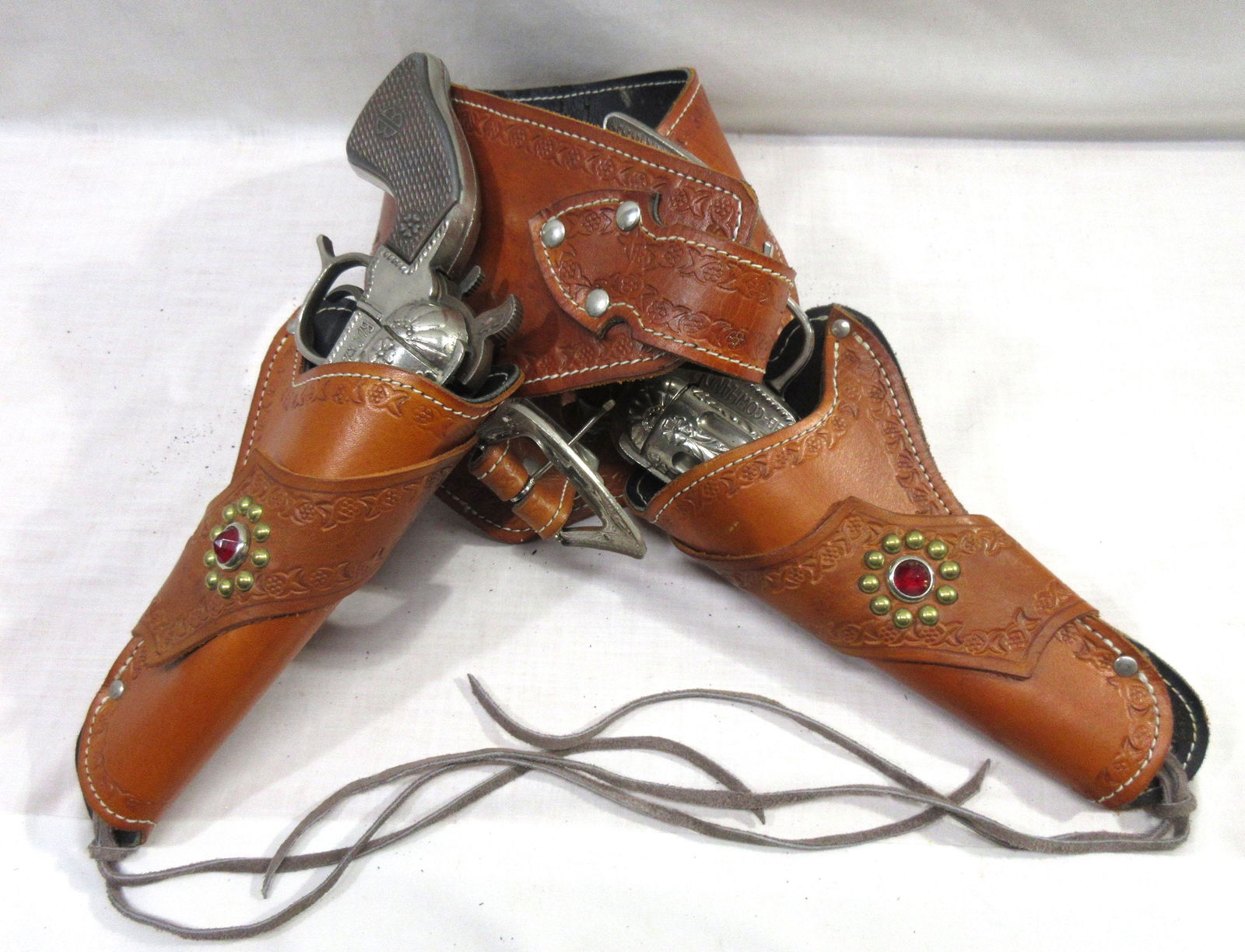 Pr Schmidt Buck'n Bronc Cowhand Cap Guns w/ Holsters: 10"L guns