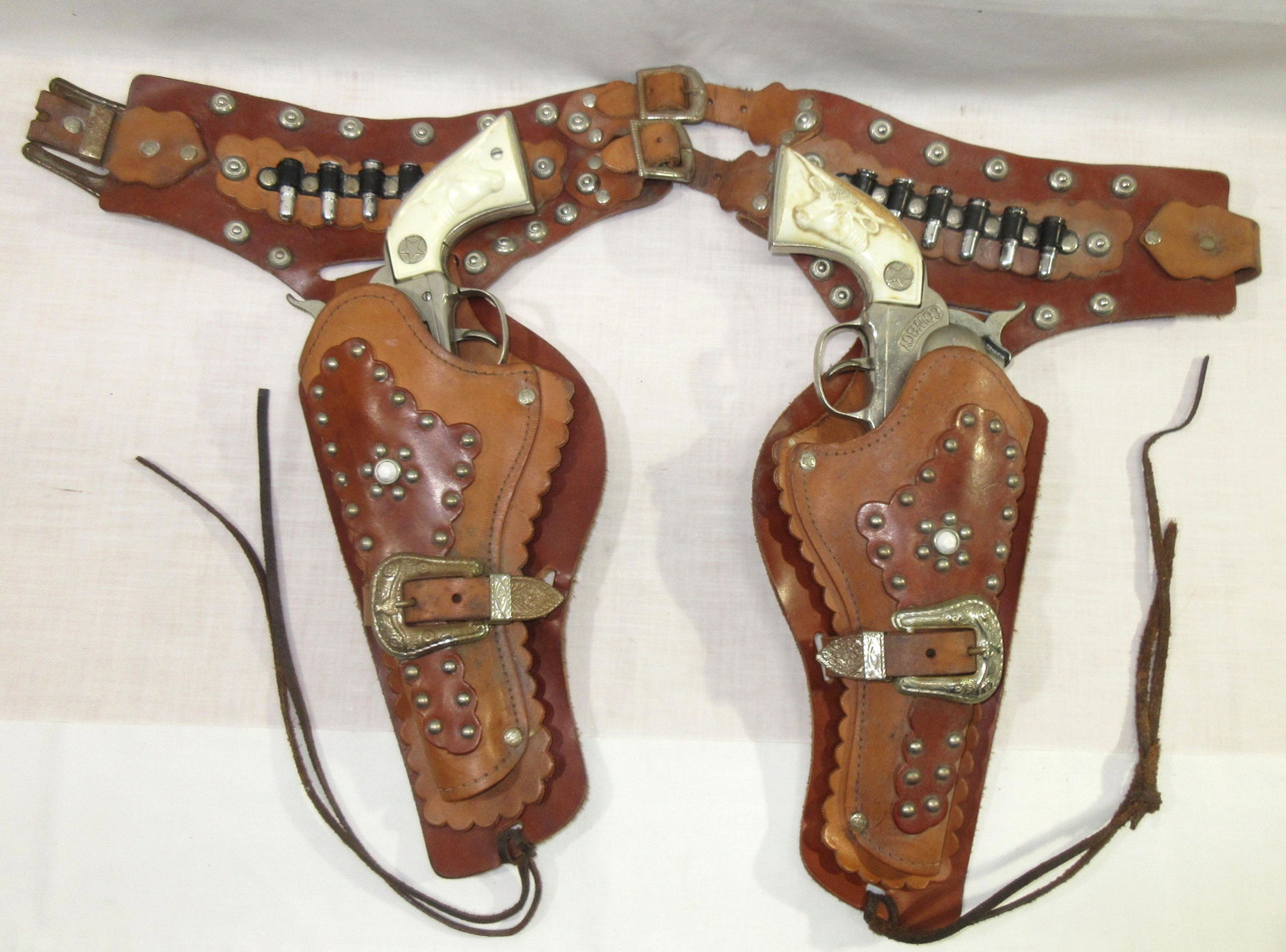 Pr Hubley Cowboy Cap Pistols w/ Holsters: 12"L pistols