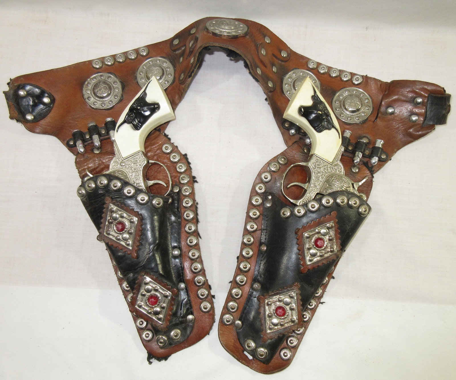 Pr Hubley Texan Jr Cap Pistols w/ Holsters: 9"L pistols