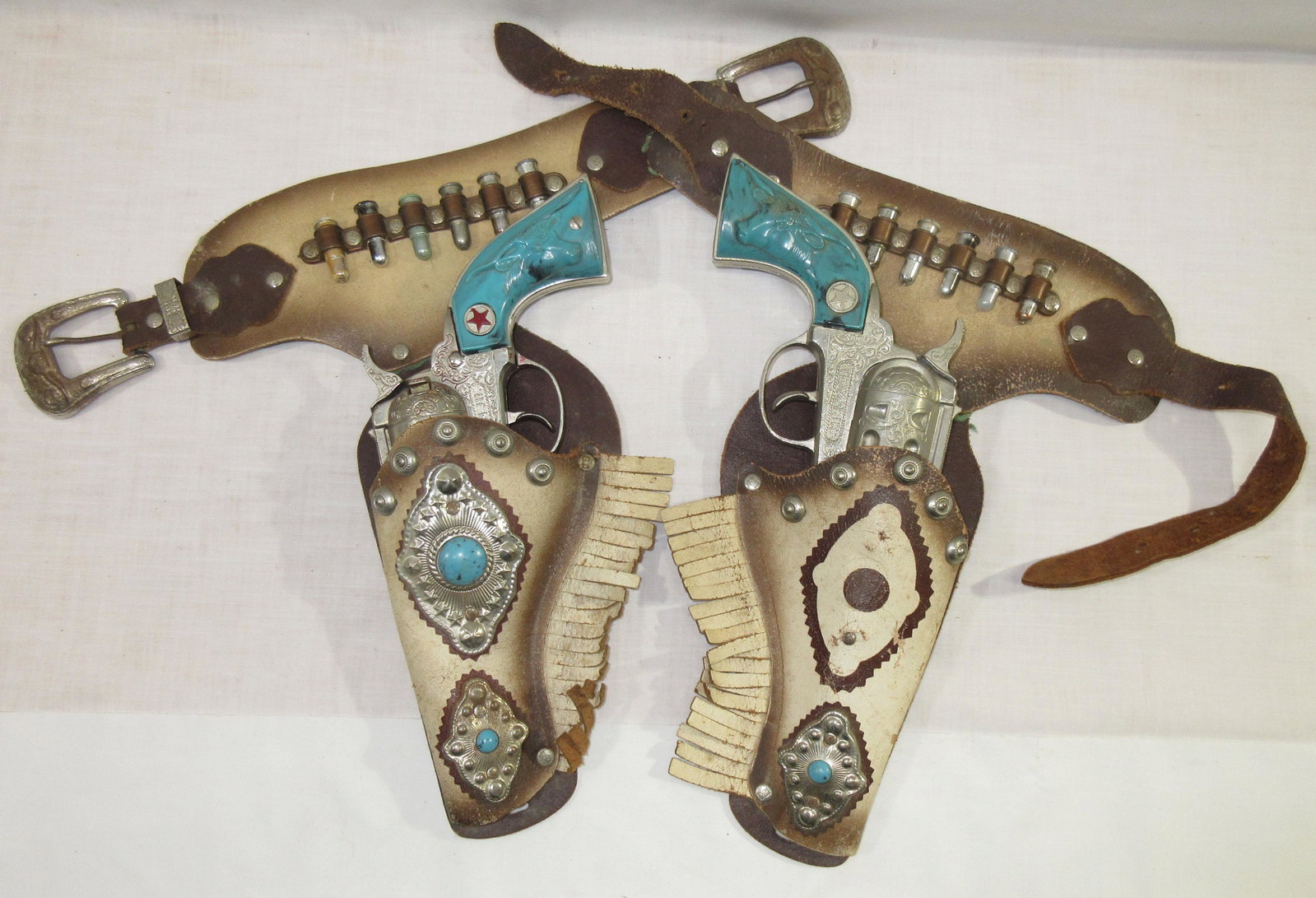 Pr Hubley Texan Jr Cap Pistols w/ Holsters: 9"L pistols