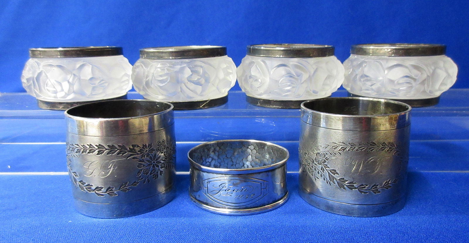 7 Napkin Rings (1 mkd Sterling): Sterling one mkd Joan 1932. 1 3/4" - 2 1/2"