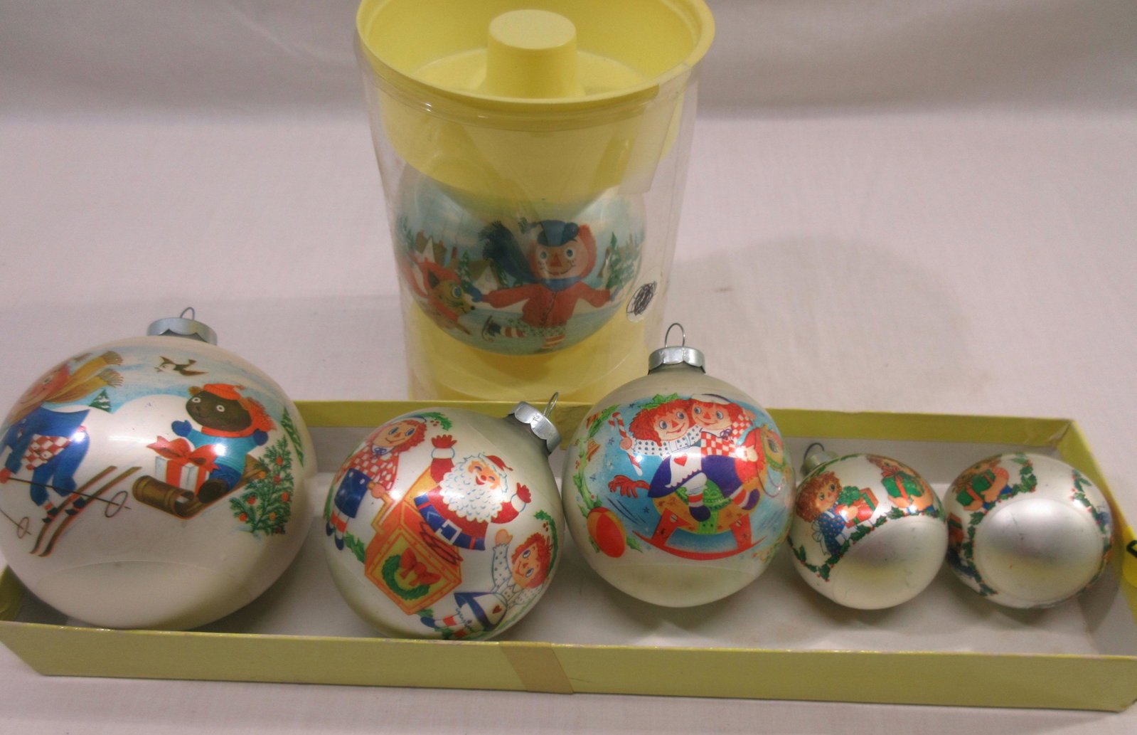 6 Raggedy Ann Ornaments: 1973, 1974, 1975 1 3/4" - 3"