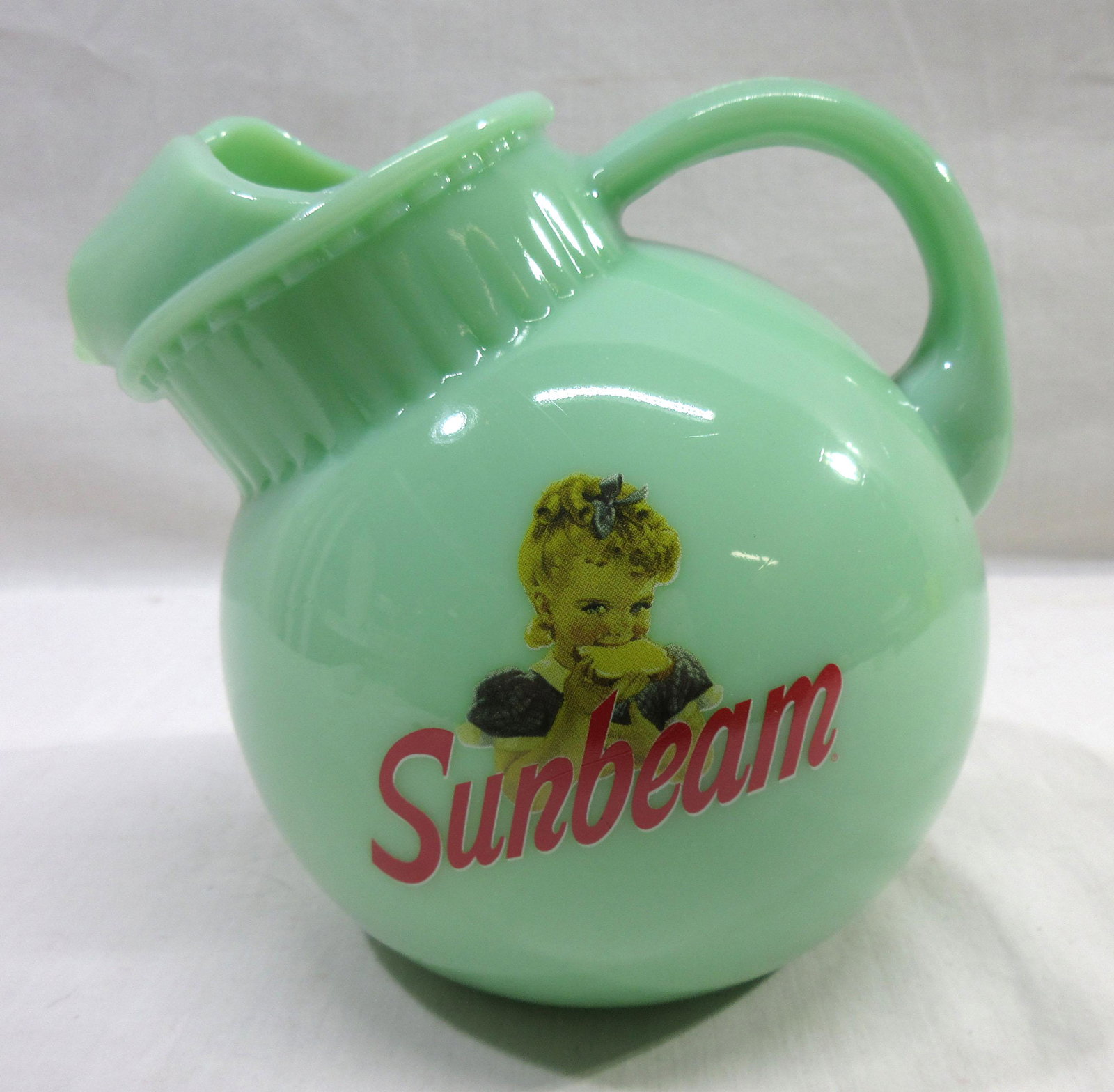 Modern Jadeite Pitcher: 6 1/2"T x 5 1/2"W