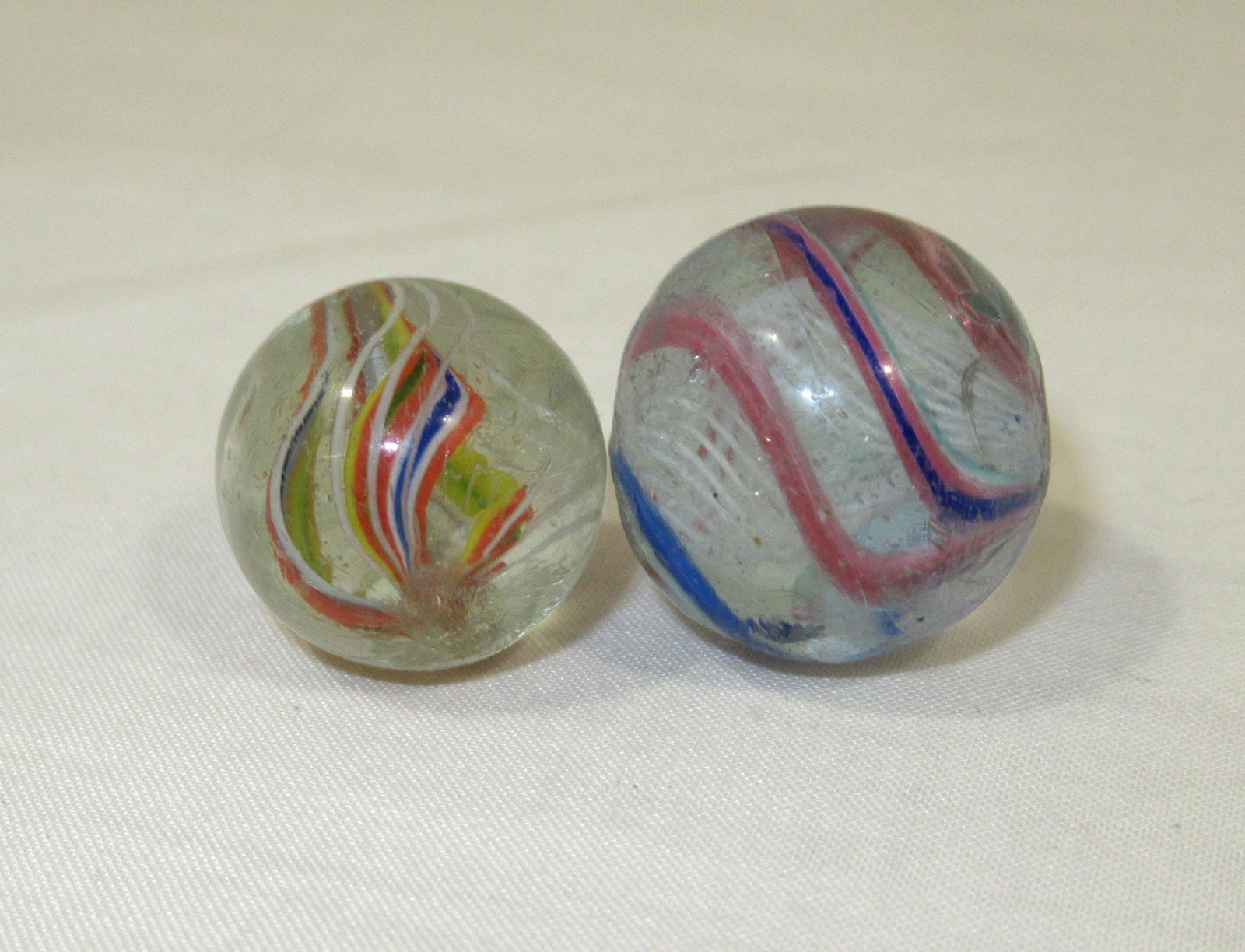 2 German Swirl Marbles: 13/16" & 11/16"