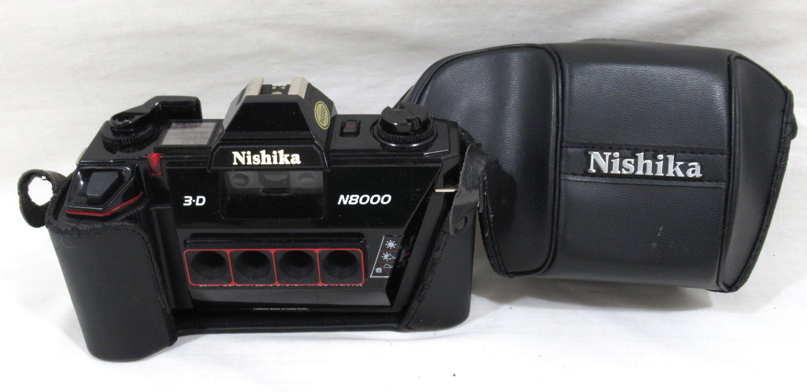 Nishika N8000 3-D 35mm Camera: 30mm Quadra lens system, hot shoe for flash, sturdy black leatherette case