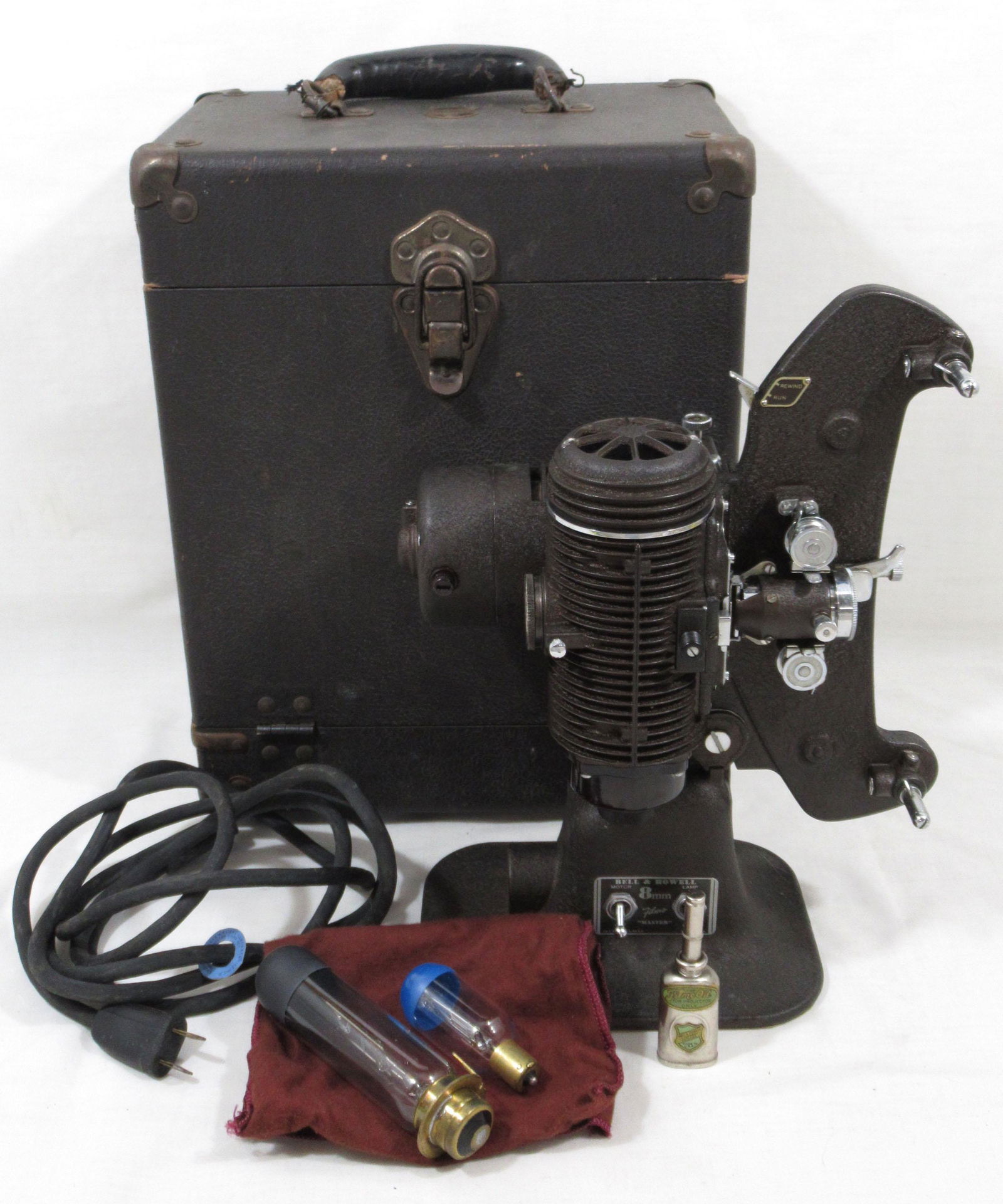 1930's Bell & Howell Filmo "Master" 8mm Projector: Inc. bulbs, in sturdy wood box/metal case, vintage can of Bell & Howell film oil