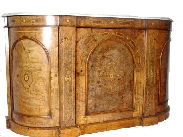 Stunning Burled And Inlaid Marble Top Credenza: with curved sides, three doors and inlaid designs throughout. Condition very good for age, minor splits on door molding, touch of sun fade. H. 35'' W. 60'' D. 17 1/2''