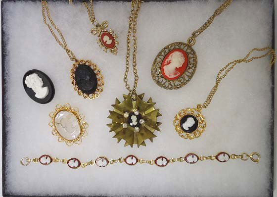 Lot of Cameo Jewelry: Lot of cameo jewelry to inc. 5 necklaces, a bracelet and 2 pins.