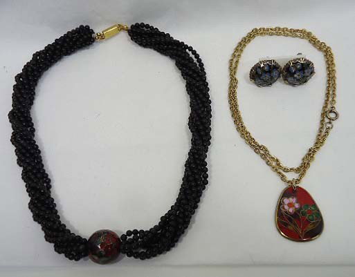 Lot of Cloisonne Jewelry: Includes a black glass bead torsade with lg. Crimson cloisonne ball, a crimson cloisonne pendant on a goldtone chain plus cloisonne earrings