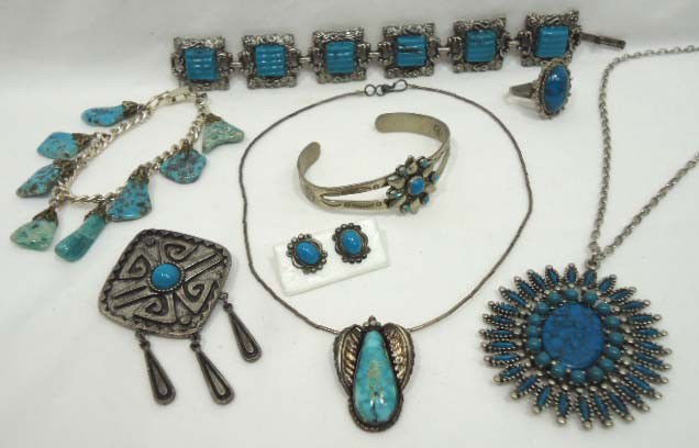 8 Pc. Turquoise Jewelry Lot: The charm bracelet and pendant necklace are true turquoise, the others are faux turquoise