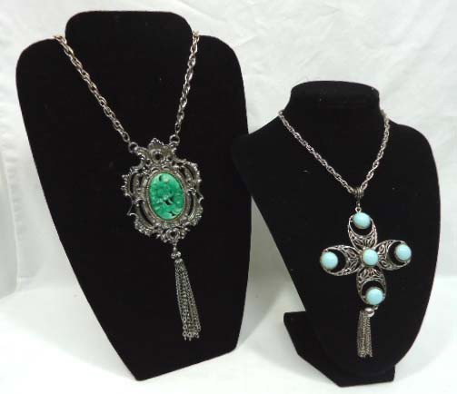 2 Holly Craft Silvertone Necklaces: 19" faux carved jade with tassel and an 18" faux turquoise cabachon cross with tassel