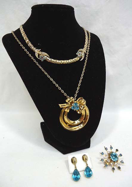 Coro Blue Rhinestone Lot: 2 necklaces 15" & 24", one brooch and a pr of drop earrings, all in goldtone