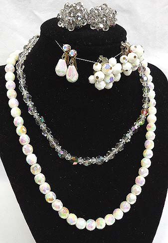 AB Crystal & White Glass Jewelry Lot: 14" AB crystal choker with matching cluster bead earrings, 18 1/2" white glass AB faceted bead necklace with oval box clasp and 2 pr. Of earrings