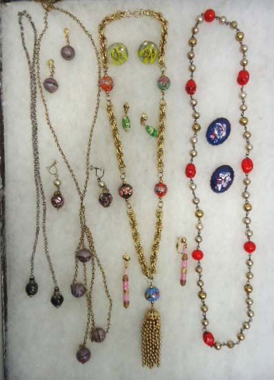 Art Glass Bead Necklace, Earring Lot: Including a 27" tasseled wedding cake glass bead necklace, a 28" red art glass bead & faux pearl necklace and 5 pr of art glass earrings, a 24" black & silver art glass bead necklace and a 28" purple 