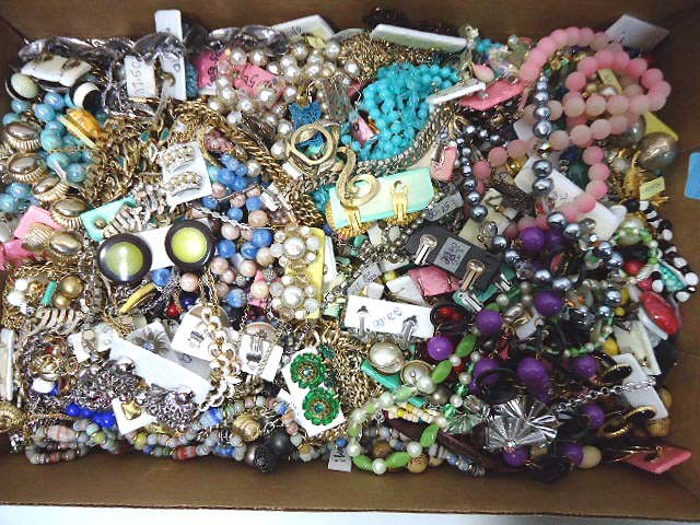 Huge 12 lb. Lot of good Costume Jewelry: The box is 12" by 18" and is 2" deep with 11.8 lbs. of wonderful jewelry, some designer names included are Tortalini, Brookraft, Jordan Marsh, Judy Lee, Marino, Mamselle, Trifari, Alice, Star, West Ge