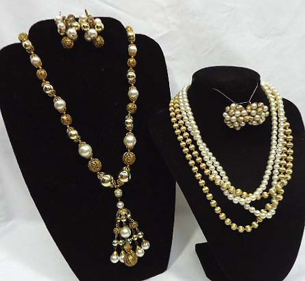 2 Faux Pearl Goldtone Necklace Sets: 4 strand 16 1/2" faux pearl and gold textured bead necklace and matching earrings and a 29" beaded tassel necklace with faux pearls and filigreed gold beads and matching earrings